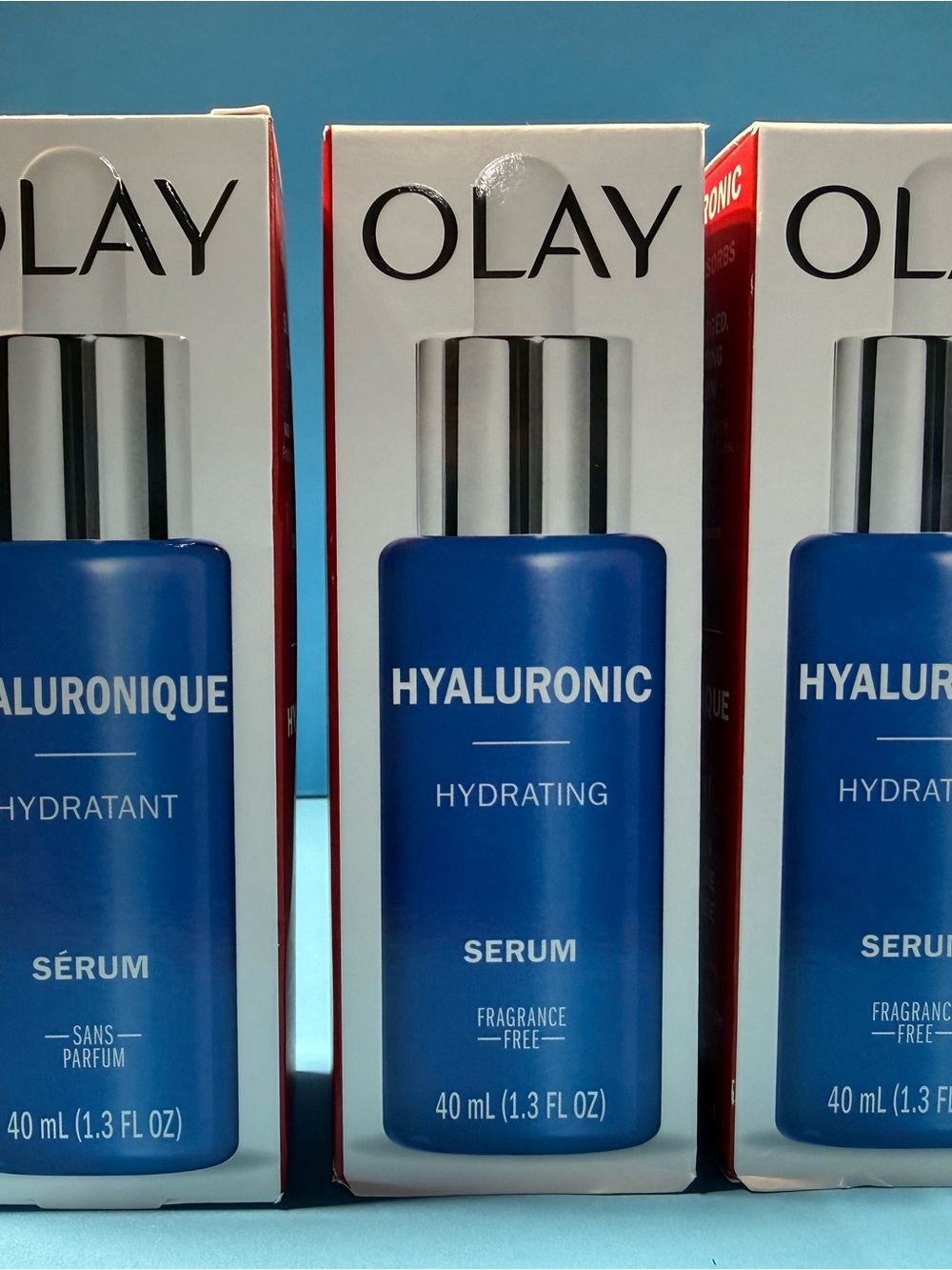 OLAY Hyaluronic Hydrating Serum - Blue and White Packaging with Red Accents
